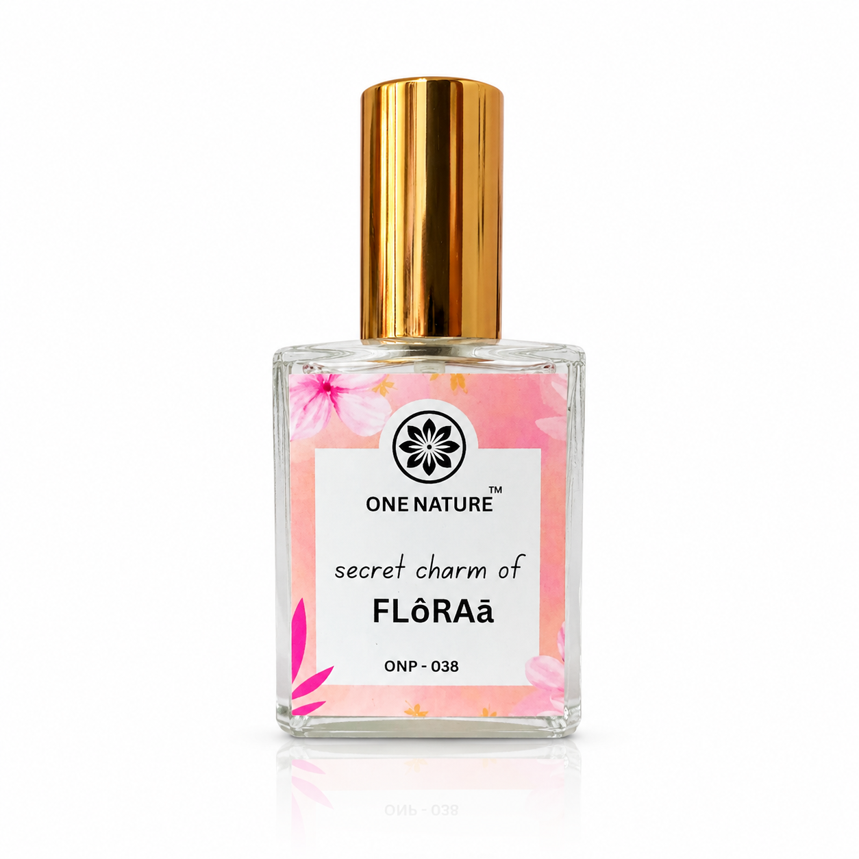 Perfume bottle with gold cap and floral design on label against a white background