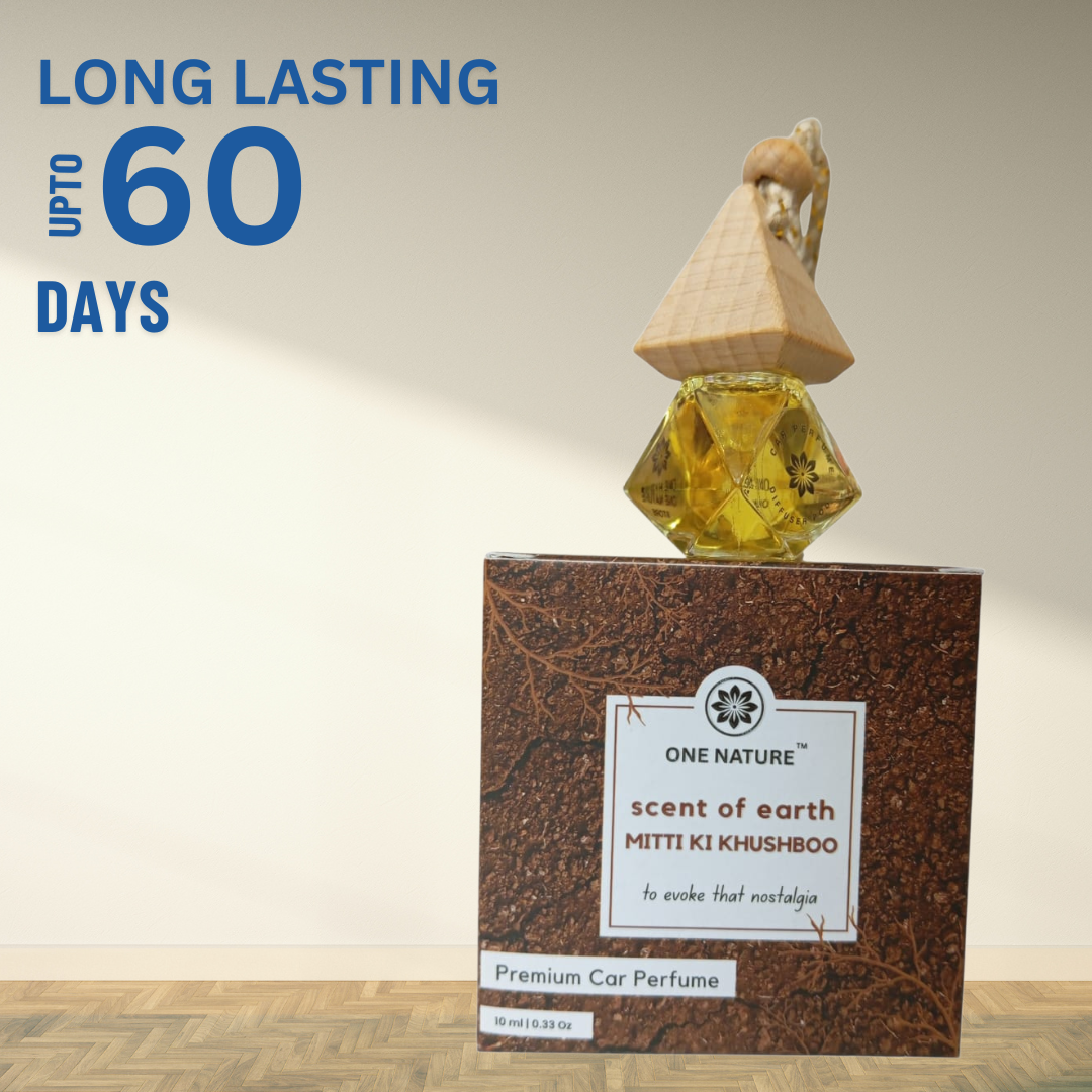 Perfume bottle with wooden cap on a wooden base, featuring text about longevity.