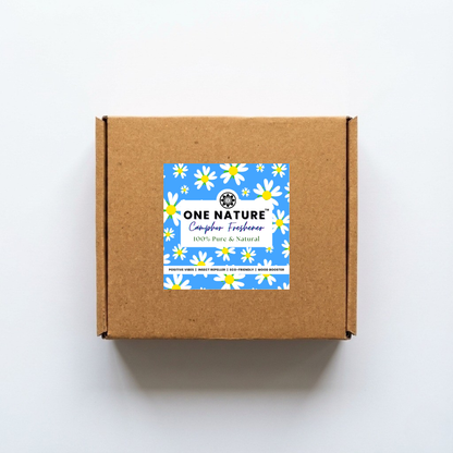Brown cardboard box with a One Nature label featuring flowers on a white background