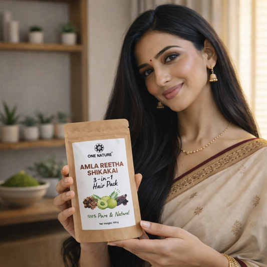 Woman holding a hair pack product with a neutral background