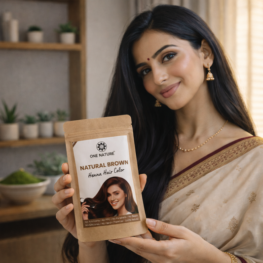 Woman holding a package of One Nature Natural Brown Henna Hair Color