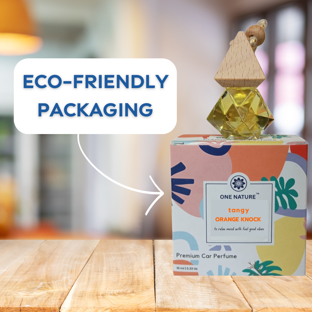 One Nature car perfume with colorful packaging on a wooden surface, labeled as eco-friendly.