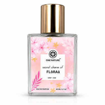 Perfume bottle with floral design and gold cap on a white background