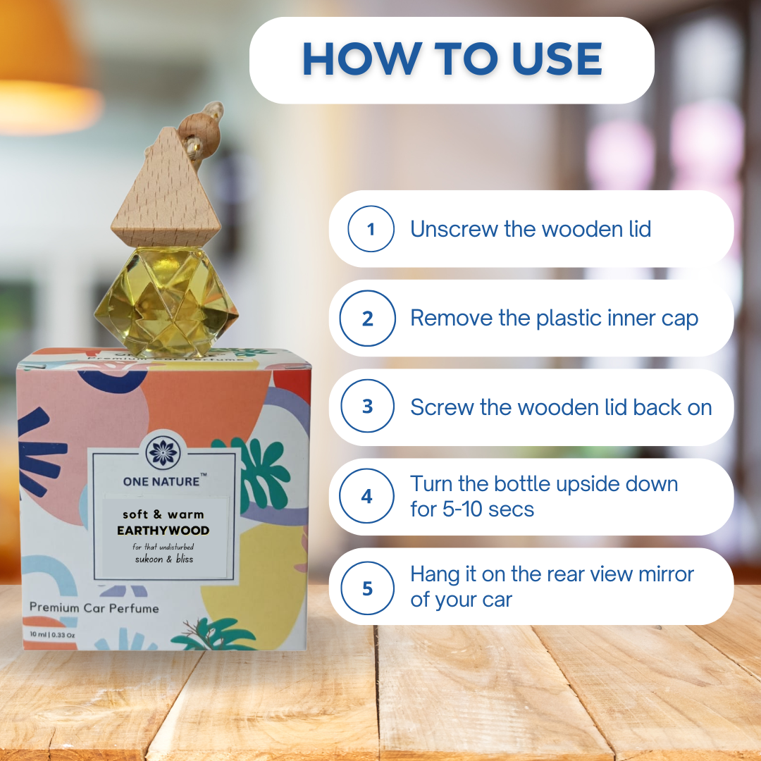 Car perfume bottle with usage instructions on a wooden surface