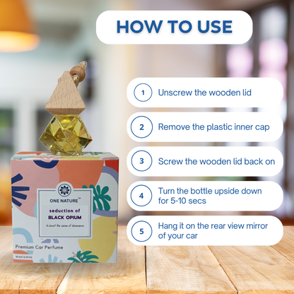 Car perfume bottle with usage instructions on a wooden surface