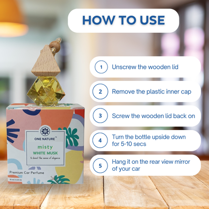 Car perfume bottle with usage instructions on a wooden surface