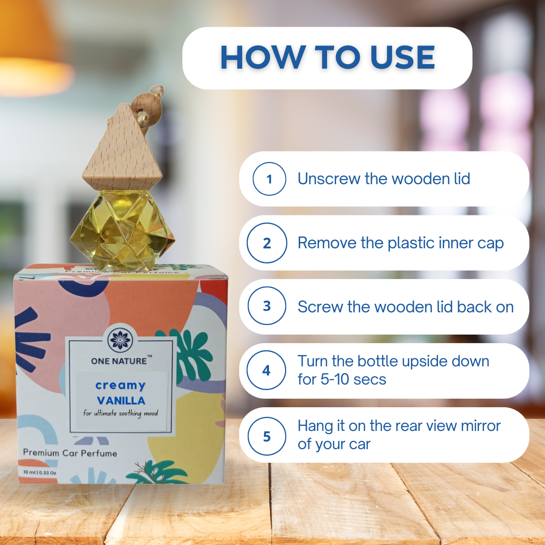 Vanilla car perfume bottle with usage instructions on a wooden surface