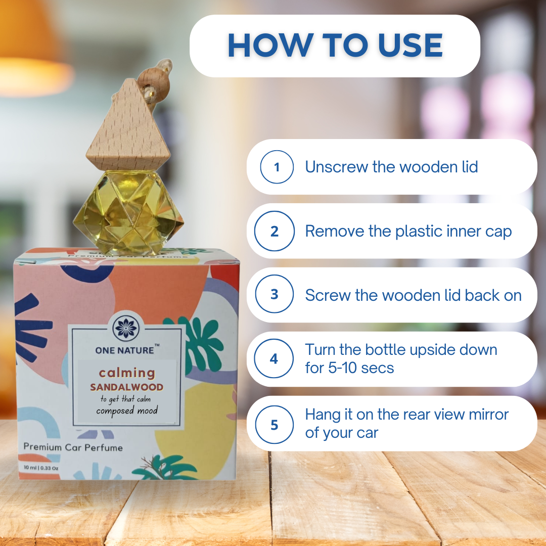 Car perfume bottle with usage instructions on a wooden surface