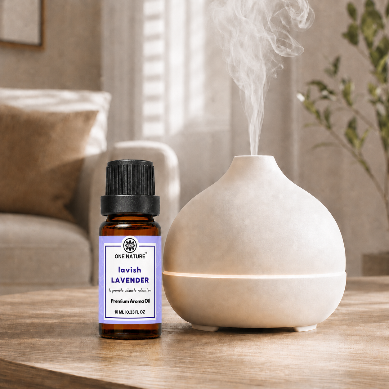 A bottle of One Nature Lavender Premium Aroma Oil stands next to a ceramic diffuser on a wooden table, with steam visibly rising from the diffuser in a softly lit home interior.