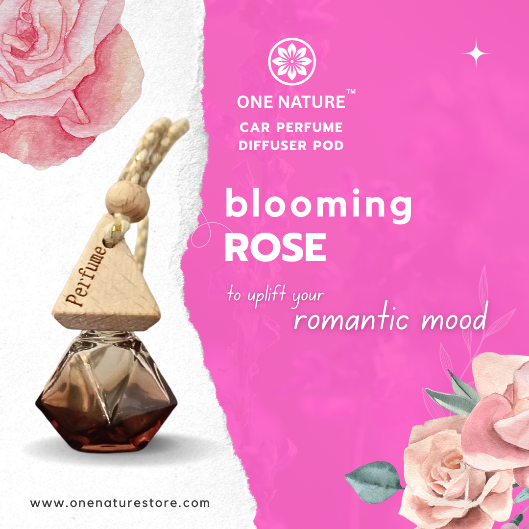 One Nature Car Perfume Diffuser Pod with 'Blooming Rose' fragrance on a pink background with roses.
