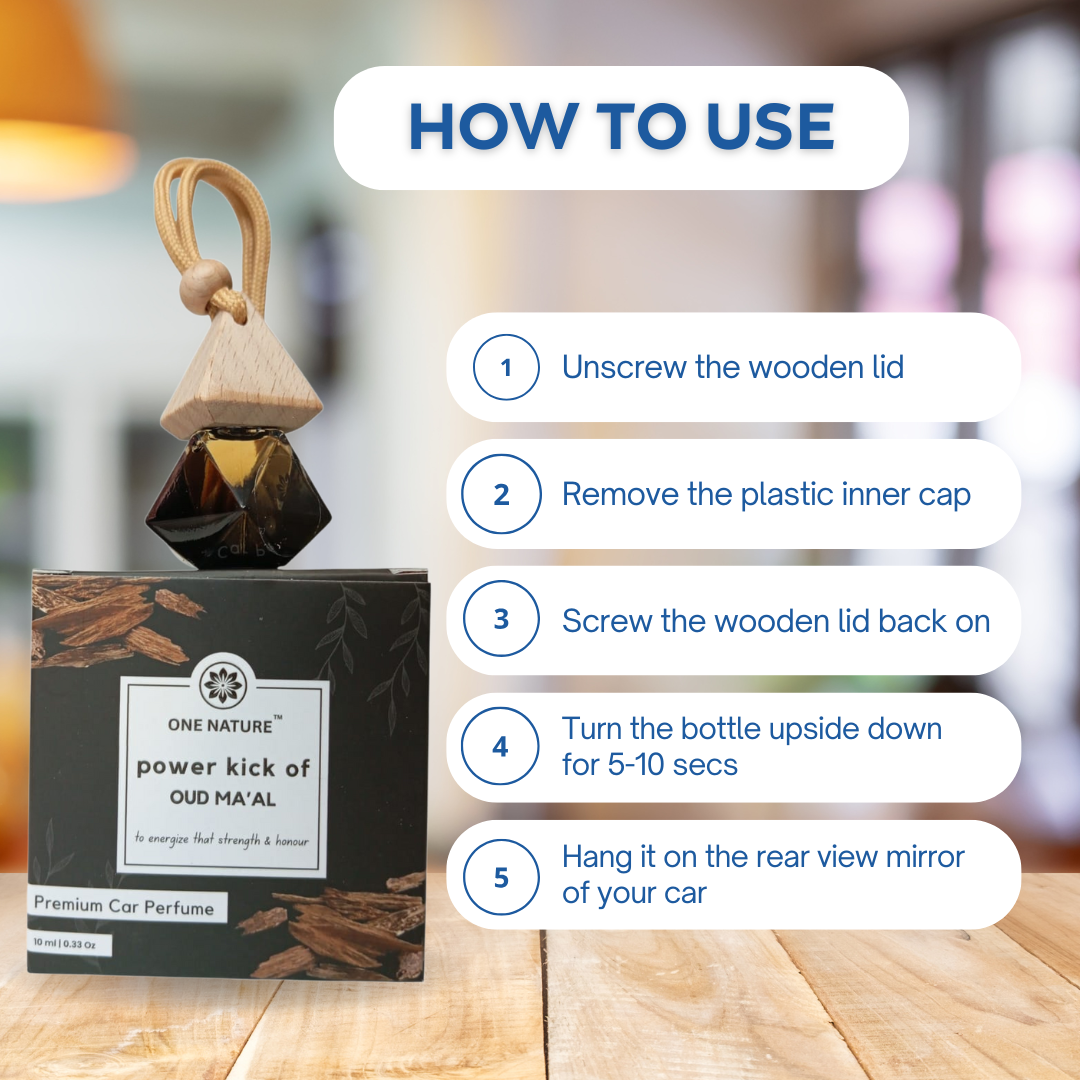 Car perfume with packaging and usage instructions on a wooden surface.