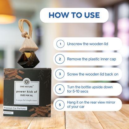 Car perfume with packaging and usage instructions on a wooden surface.