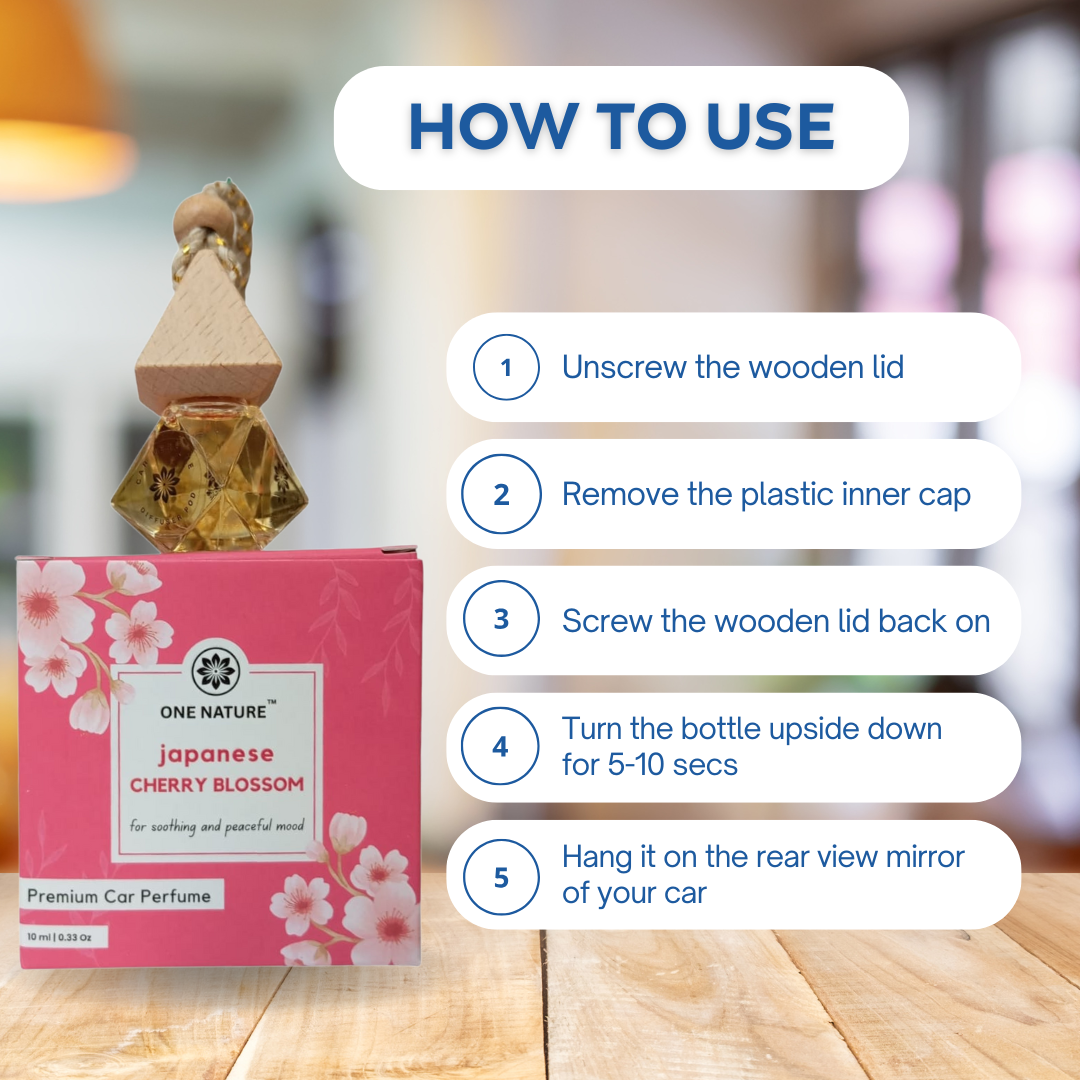 Car perfume bottle with wooden lid and pink packaging, accompanied by usage instructions.