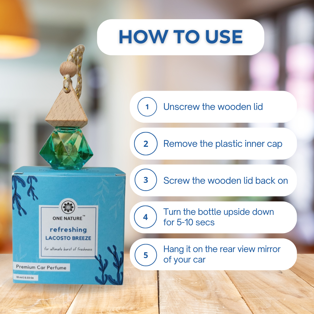 Car perfume bottle with usage instructions on a blurred background