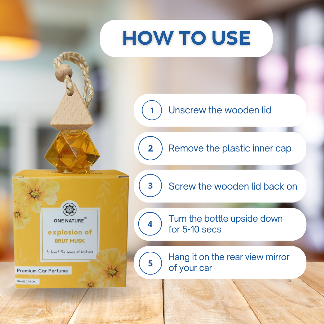 Car perfume with packaging and usage instructions on a wooden surface.